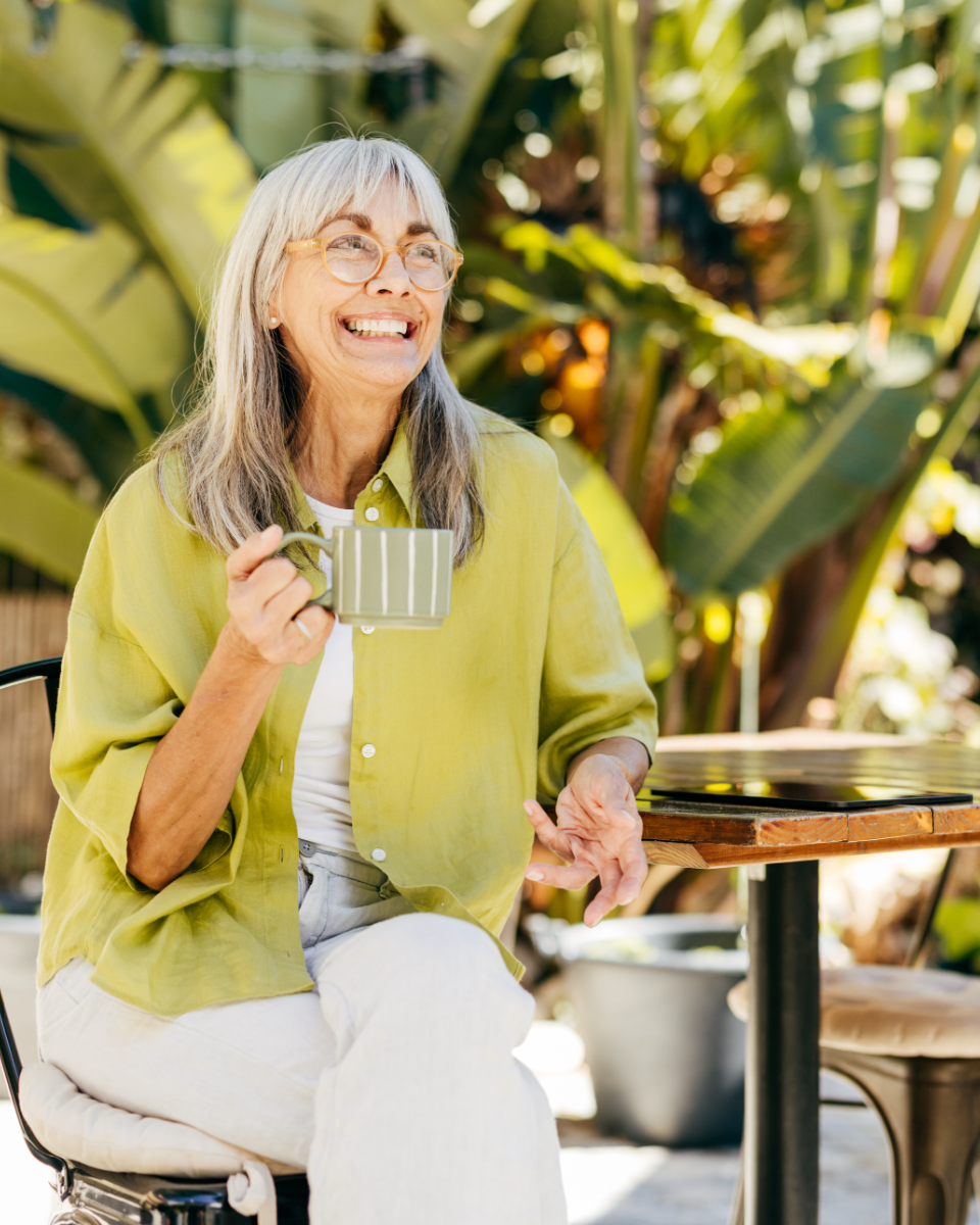 A DearBill member enjoying coffee outdoors